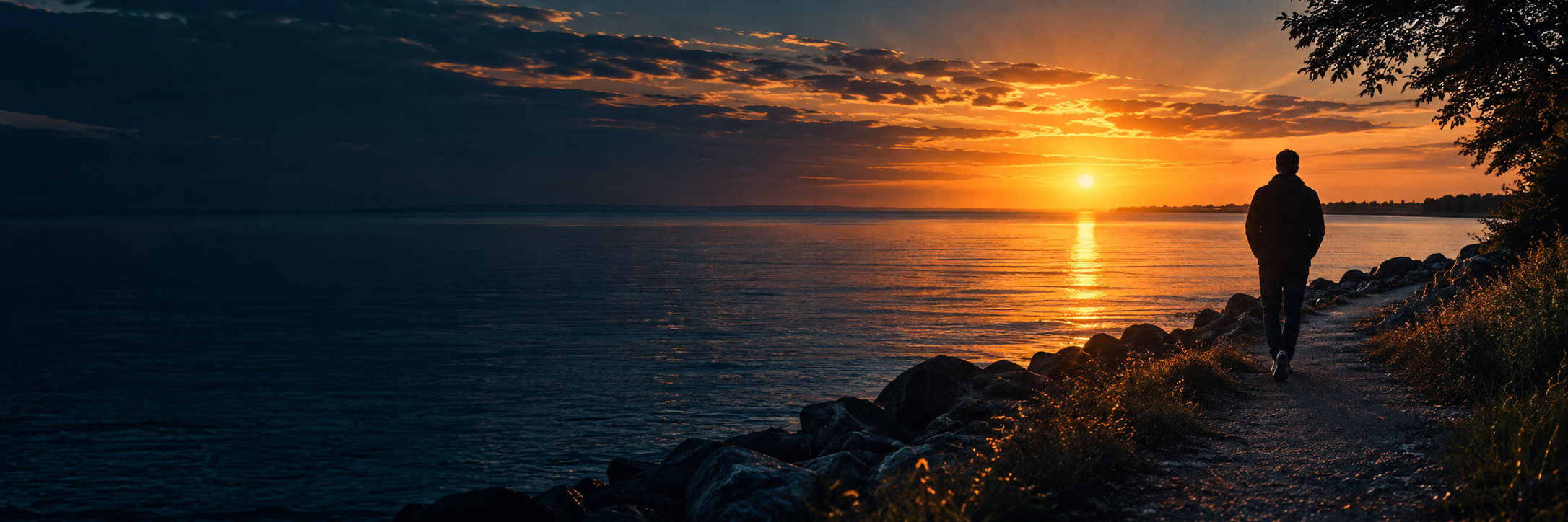 A reflective waterfront at sunset